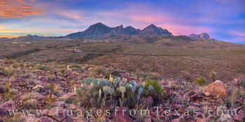 This panorama from Big Bend National Park shows Panther Junction with the Chisos Mountains rising high above in the distance.