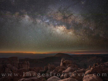 The Milky Way shines above the Grapevine Hills and boulders around balanced rock on a cold spring night in Big Bend NP.