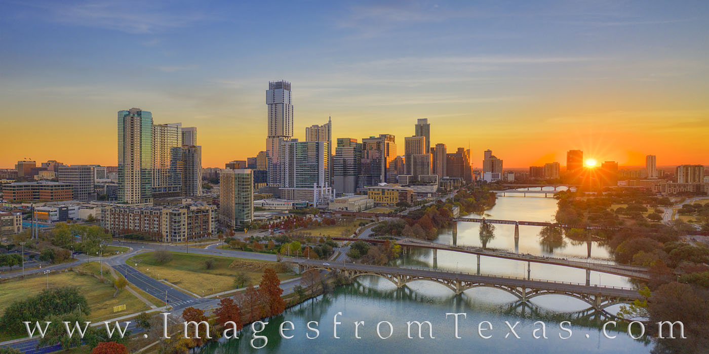 On a cool morning in early December, the downtown area of Austin, Texas, begins to warm in the first light of day. In this aerial...