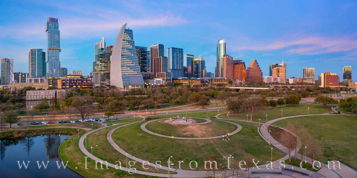 On a peaceful evening near downtown Austin, the colors fade and the lights turn on. The skyline here is constantly changing...