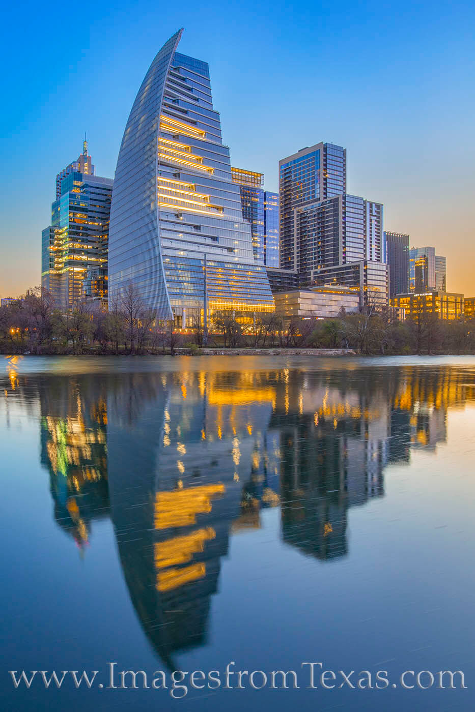 A long exposure brought out the deep blue color well before sunrise in downtown Austin, Texas. In the forefront of this scene...
