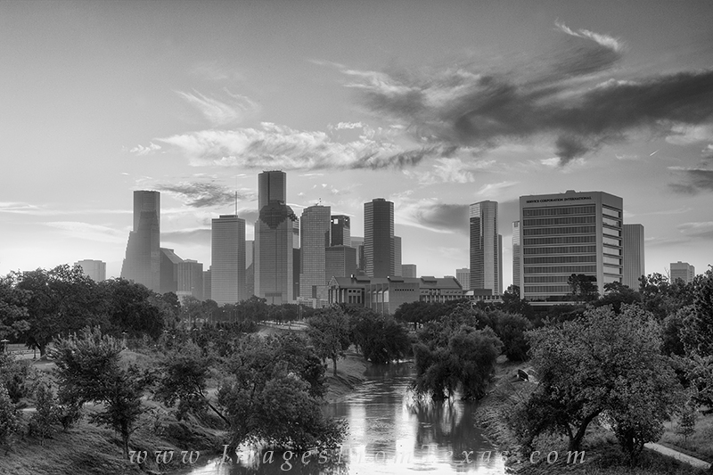 Late summer found me photographing the Houston skyline. Here on a pedestrain bridge along the Buffalo Bayou, sunrise is moments...