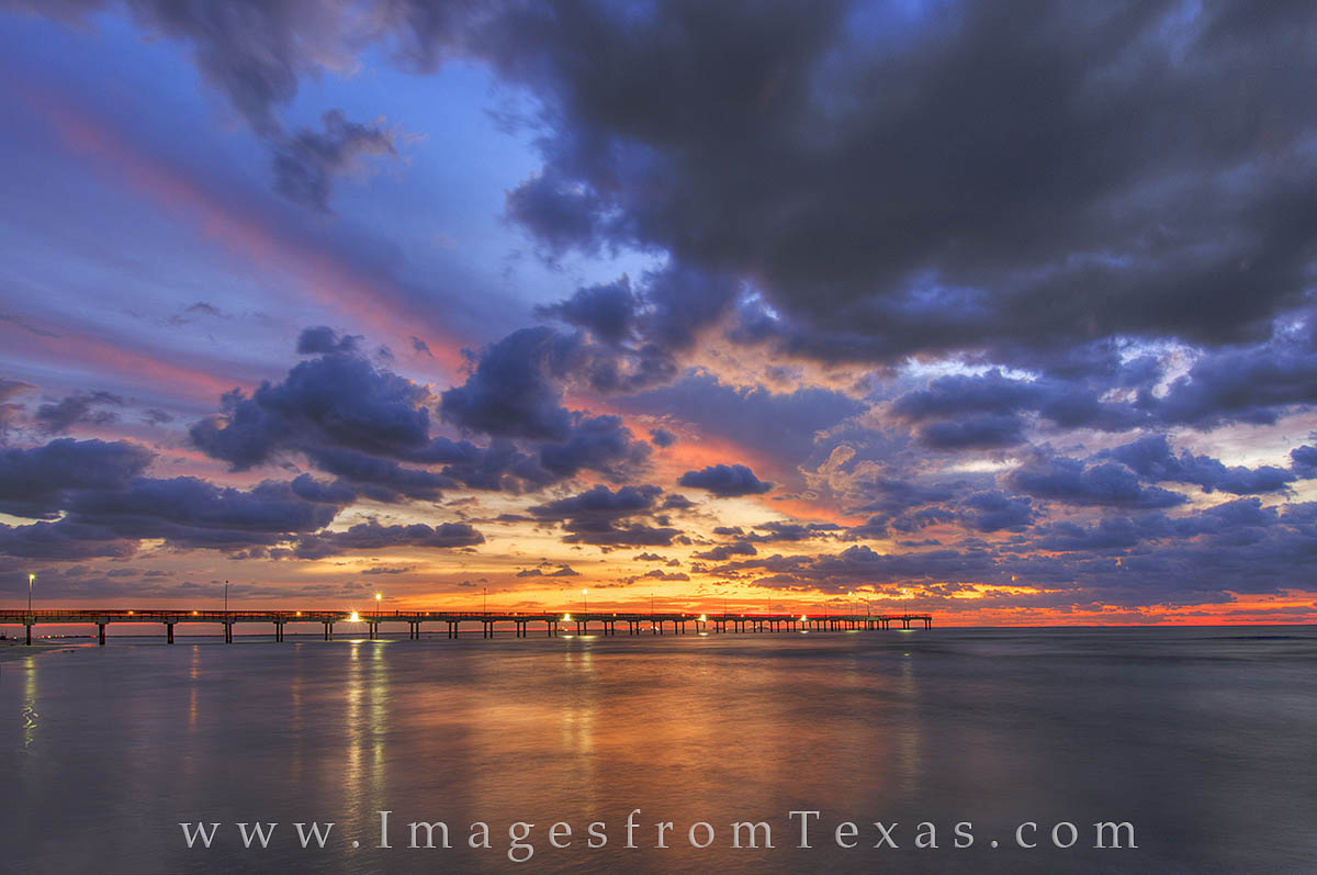 Amazing light welcomes the morning in Port Aransas, Texas. Taken along the beach near Caldwell Pier, this photograph shows a...