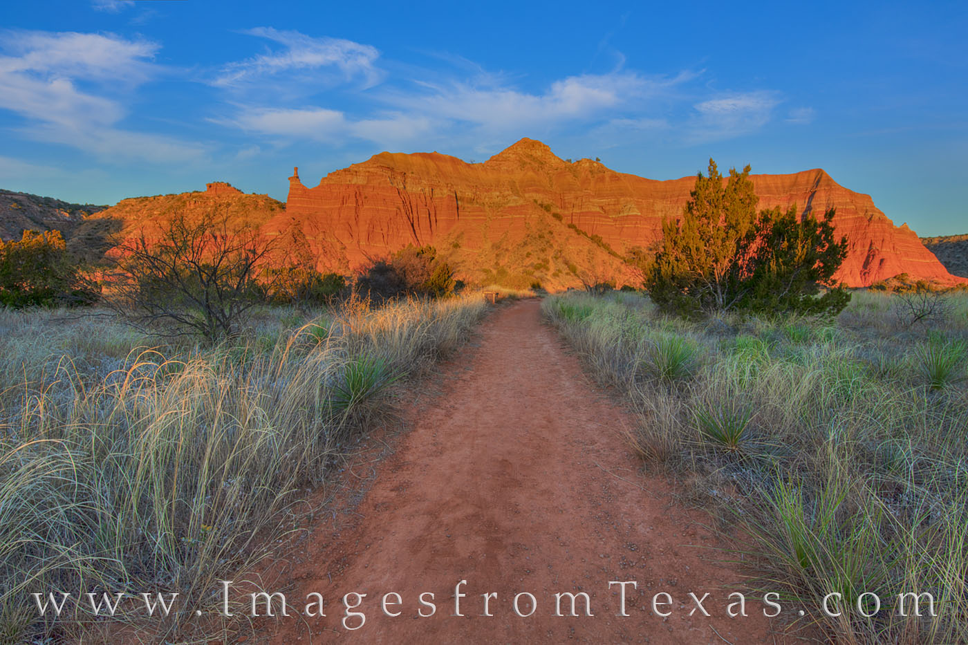 The Lighthouse Trail in Palo Duro Canyon leads through beautiful country in the red rocks and cliffs of this state park near...