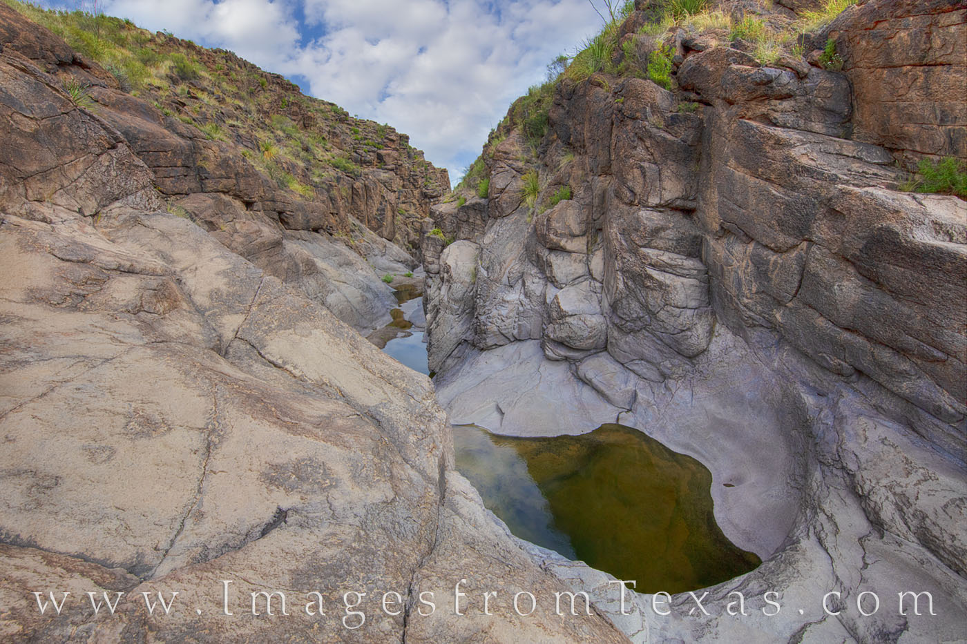 The Cinco Tinajas trail leads to the “five pools” - five small collections of water held in a quaint rock canyon. These pools...