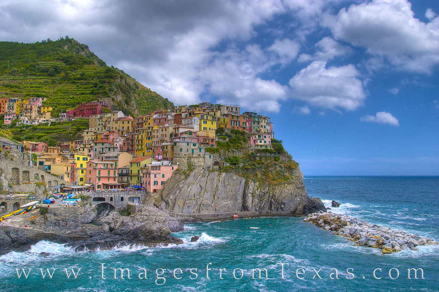 The late morning in Manarola, Italy, finds soft clouds floating across this sleepy village along the Italian Riveria. One of...