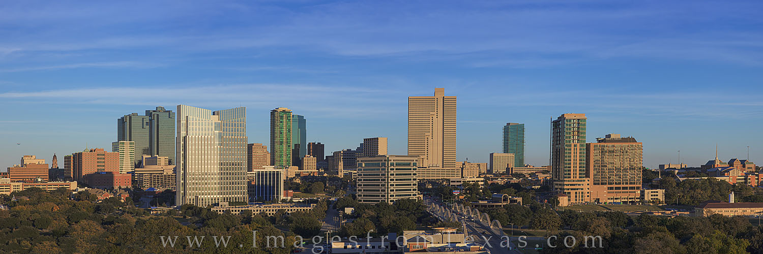 Under blue skies, the Fort Worth, Texas, skyline rises into the cool Autumn air. While both older and modern buildings make up...