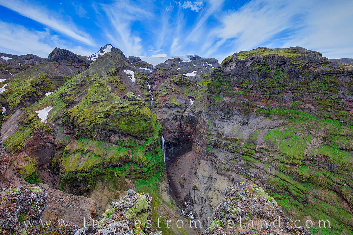 From the end of the Mulagljufur Canyon trail in south Iceland, the views across to Mulafoss (the waterfall) and the canyon that...