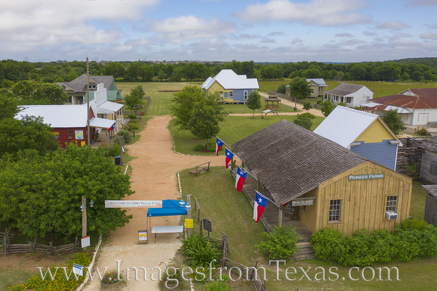 This aerial view shows the entrance to Jourdan Bachman Pioneer Farm, a northeast Austin location showcasing six themed historic...