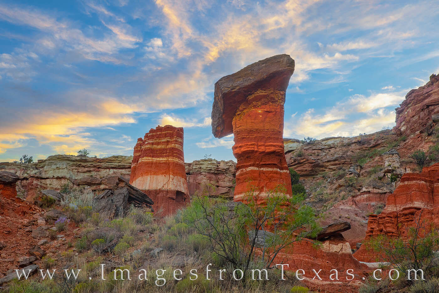 The Devil’s Tombstone is an impressive hoodoo in Palo Duro Canyon. It seems to balance a large slab of rock on its top. This...