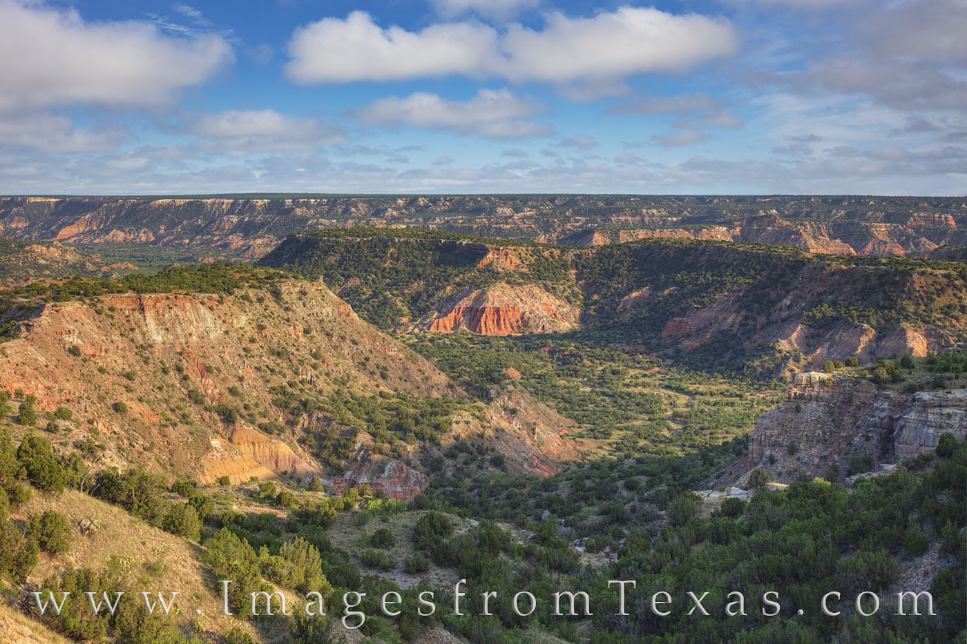 From an overlook just off the main road in Palo Duro Canyon, this view looks east and shows the canyon and its colorful rock...
