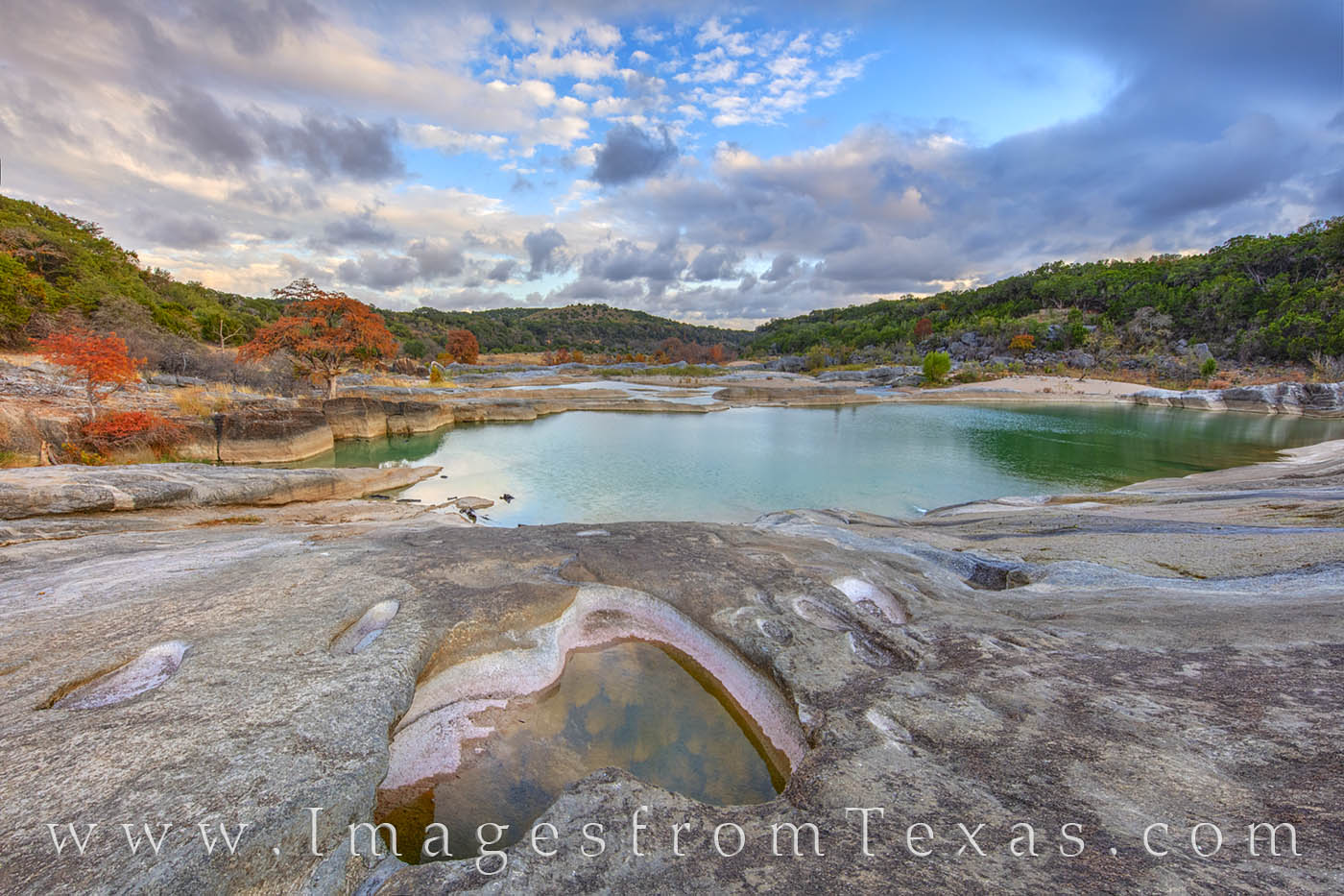 One of the pools along the falls of the Pederales River rests quietly in the late afternoon. Along the rier’s path, cypress...