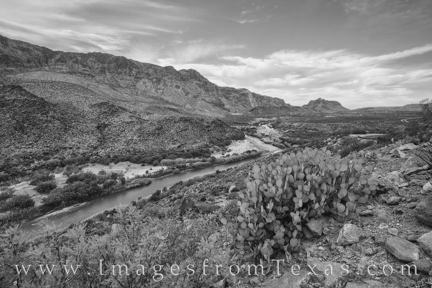 This black and white photograph from west Texas and the Big Bend area shows the rugged landscape as the river winds its way east...