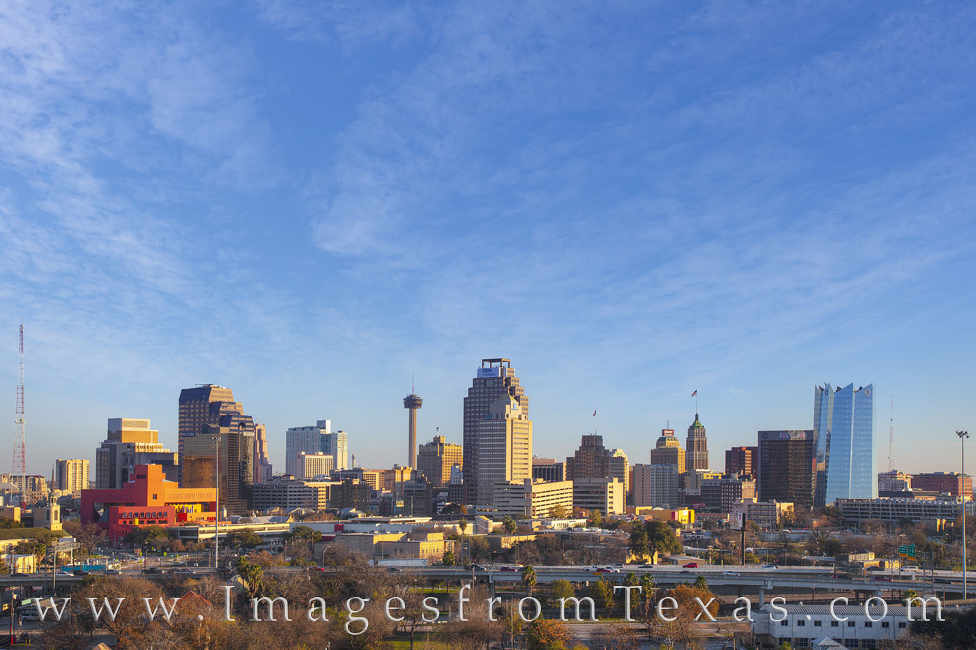 High clouds drift over the downtown San Antonio skyline on a crisp winter afternoon. The skyline is made distinctive from the...