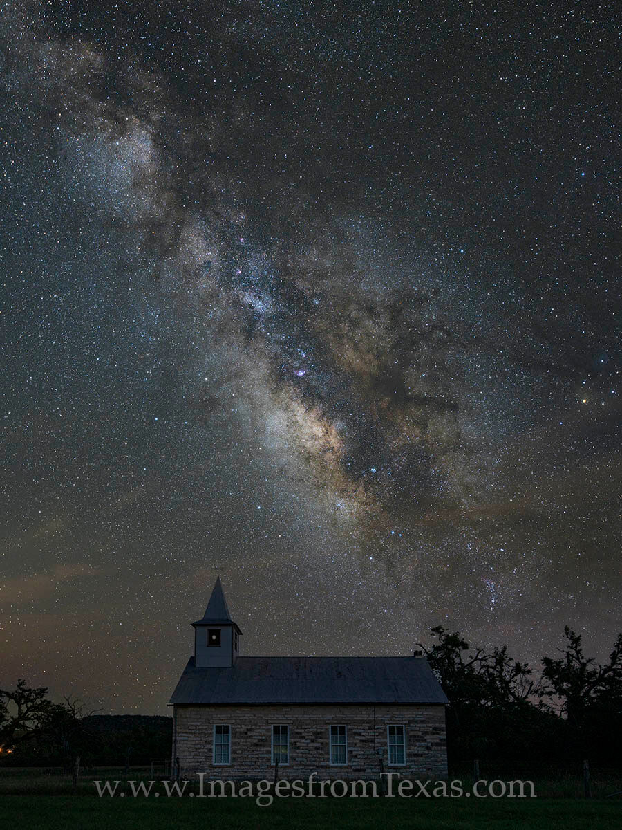 This little church on the way to Enchanted Rock sits quietly as the Milky Way rolls across the nighttime summer sky. Taken on...