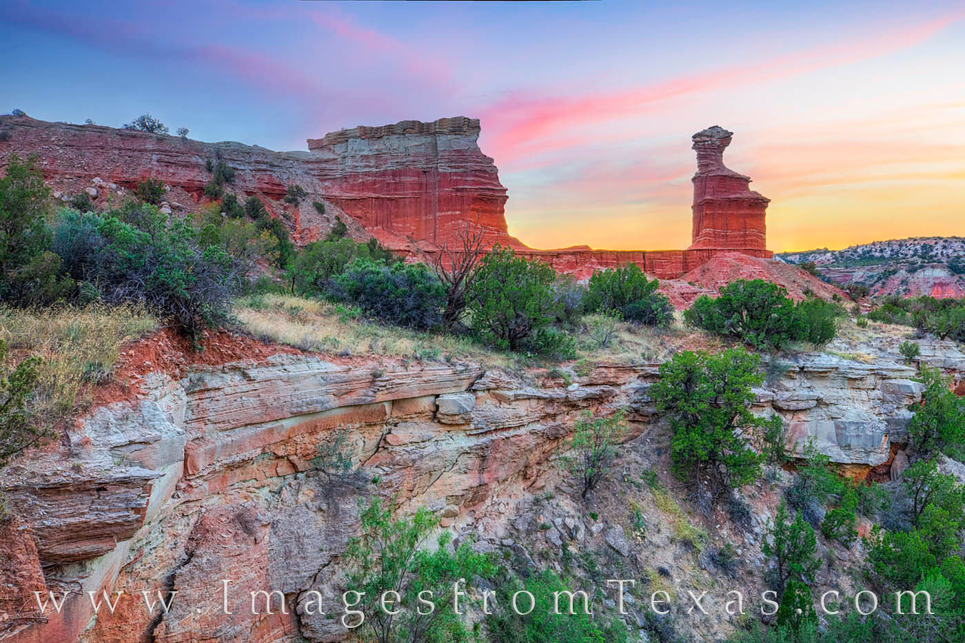 The Lighthouse hoodoo rises into the fading light in Palo Duro Canyon.