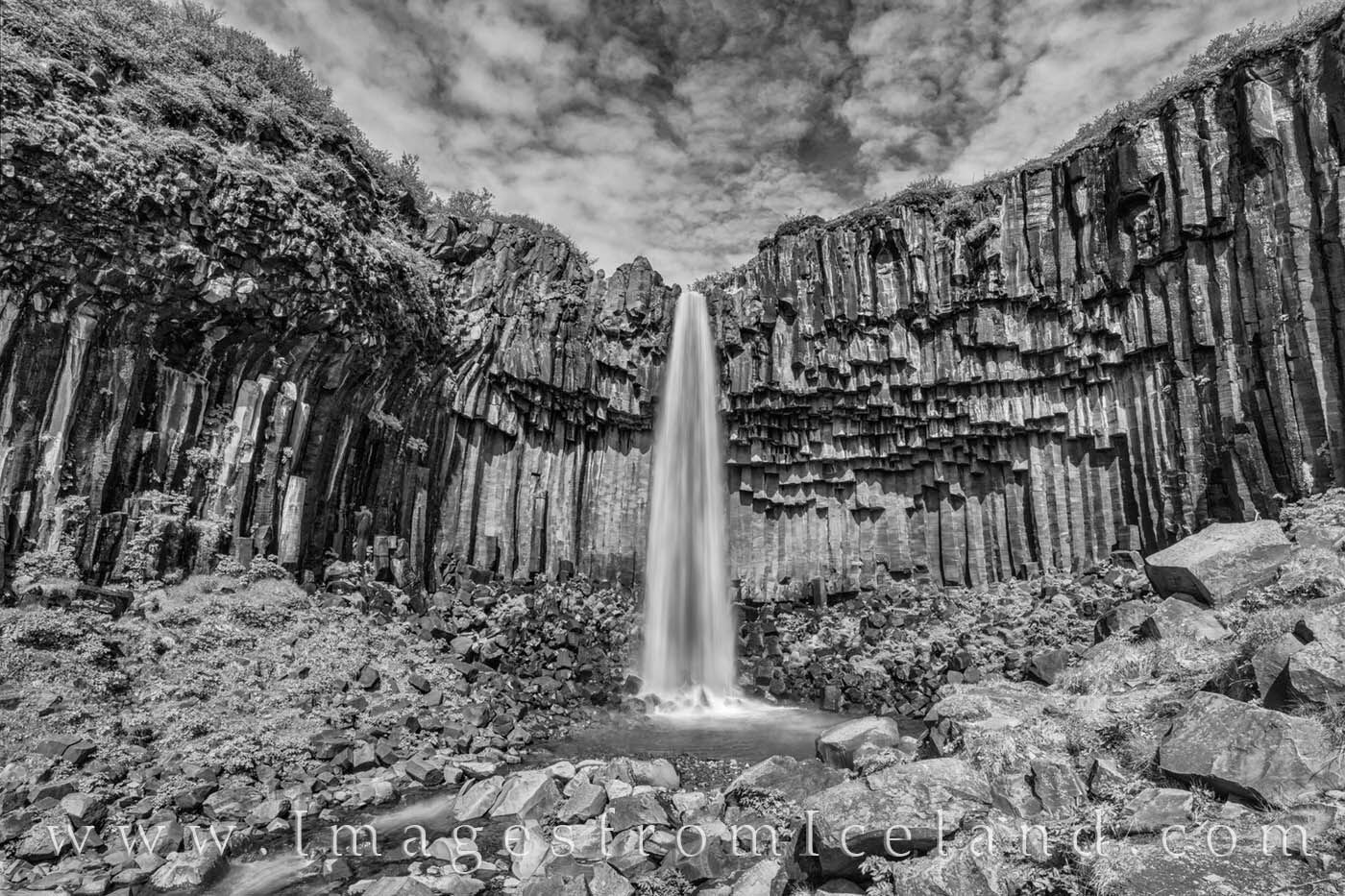 Svartifoss waterfall in Skaftafell National Park is beautiful during the day and night, and in this black and white photograph...
