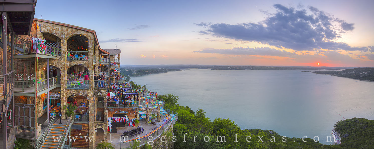 This panorama shows the iconic restaurant - The Oasis - as the sun sets across Lake Travis and Texas Hill Country. As one of...