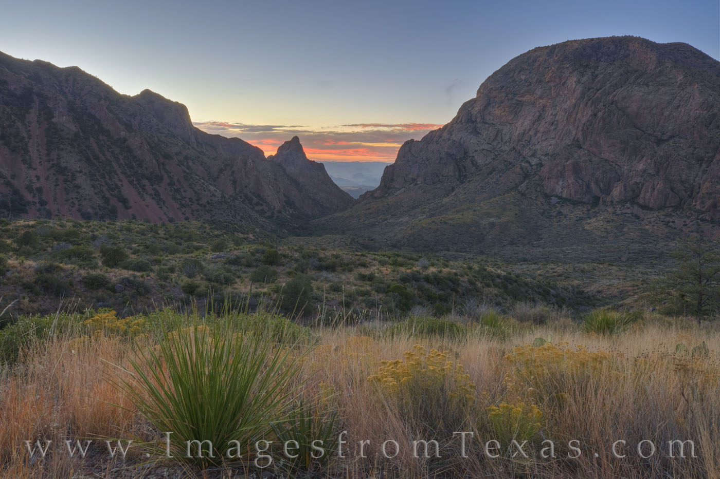 On a calm evening in November, the Chisos Mountains stand silent in Big Bend National Park. This view is an iconic landscape...