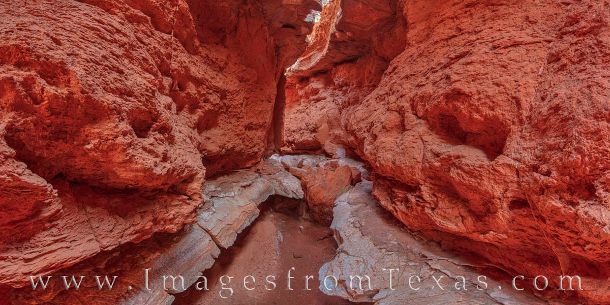 This panorama shows the beauty of Tunnel Slot Canyon located in Caprock Canyons State Park. The walls are made of quartermaster...