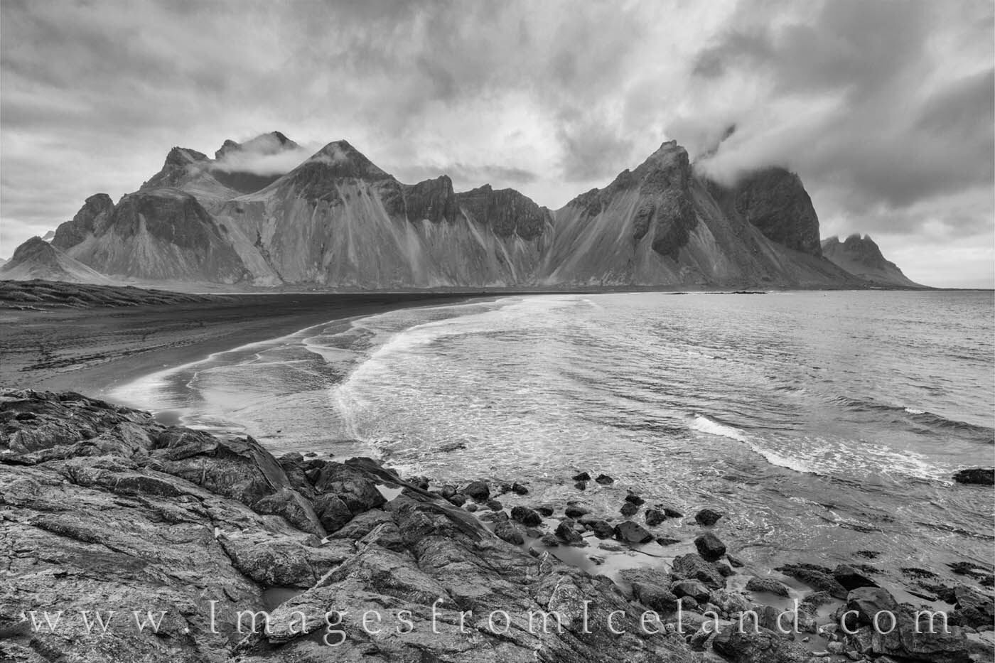 On a cold June morning, the Vestrahorn’s craggy peaks rise into the low clouds. Not far from the town of Höfn, this beautiful...
